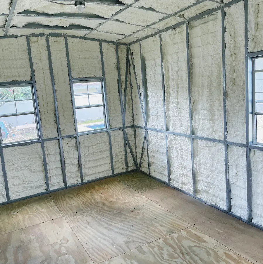 Closed-cell spray foam insulation applied to wall cavities in a residential project in Bellevue
